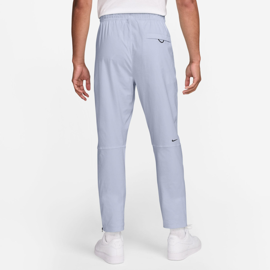 Pantalon survêtement Nike Tech Woven gris