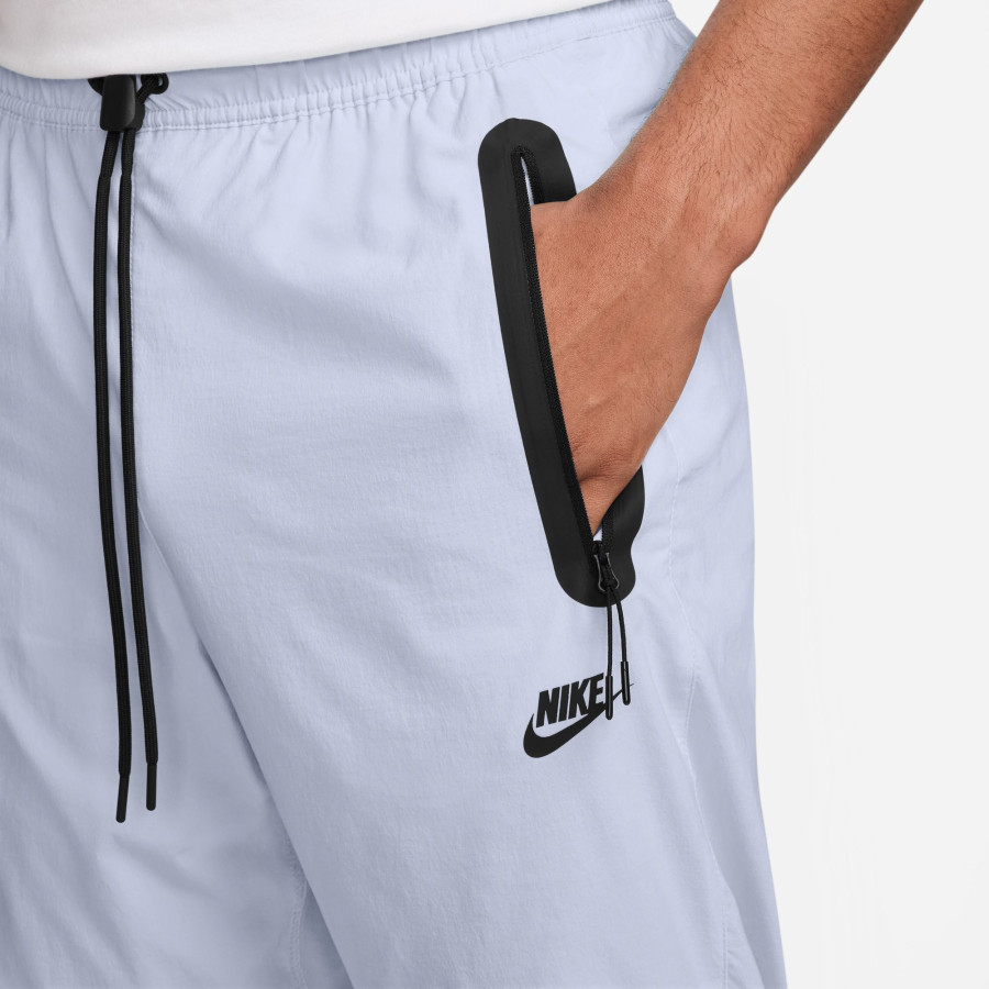 Pantalon survêtement Nike Tech Woven gris