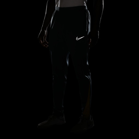 Pantalon survêtement Nike Therma-Fit gris jaune