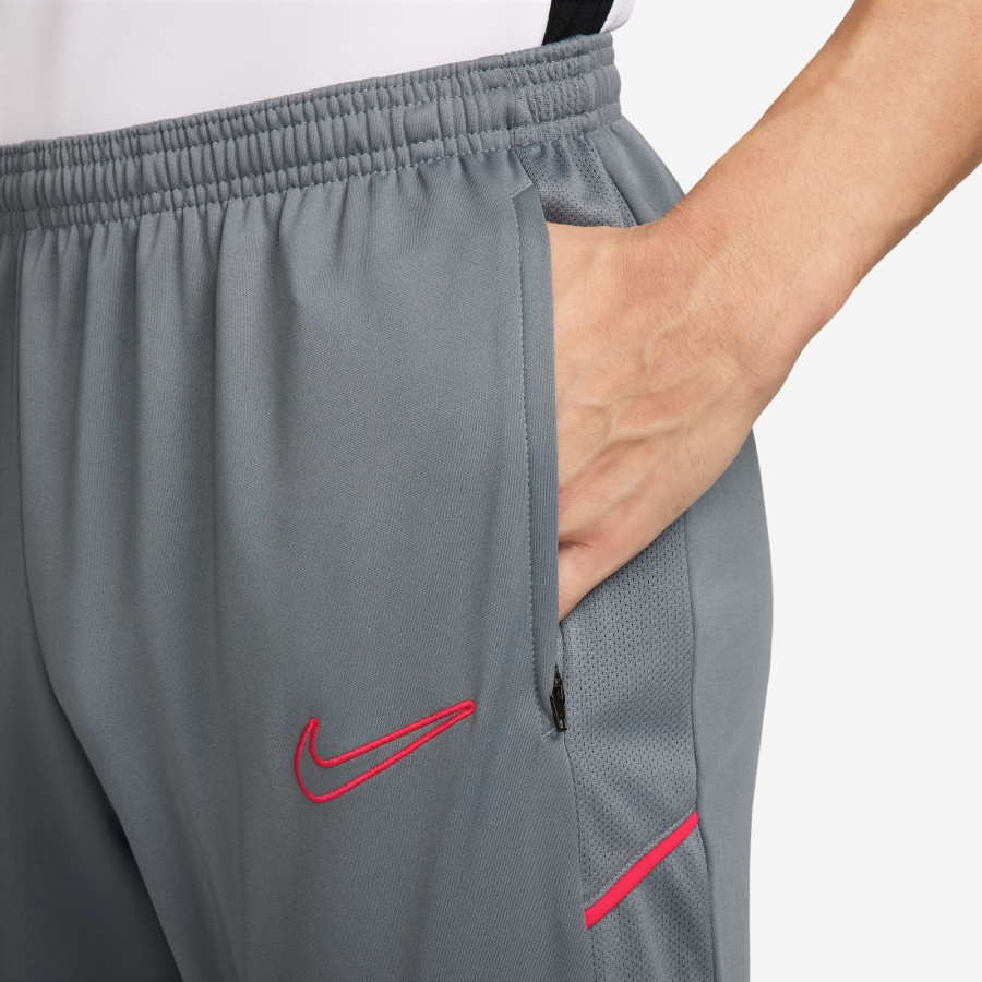 Pantalon survêtement Nike Academy gris rouge