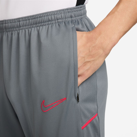 Pantalon survêtement Nike Academy gris rouge
